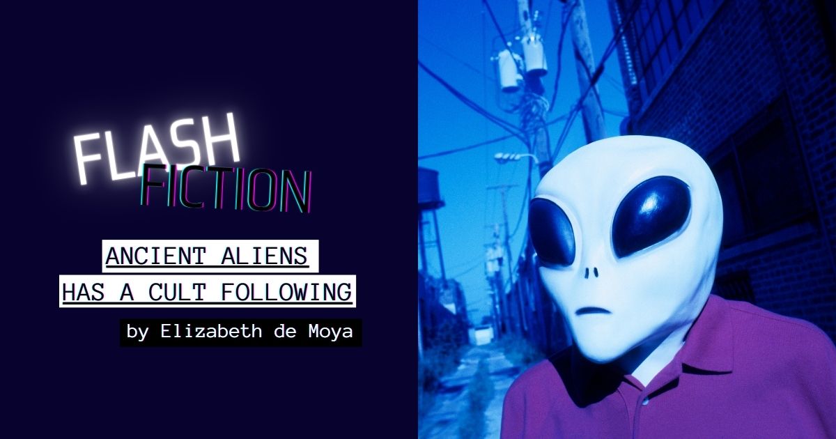 cover man in alien mask in an alley